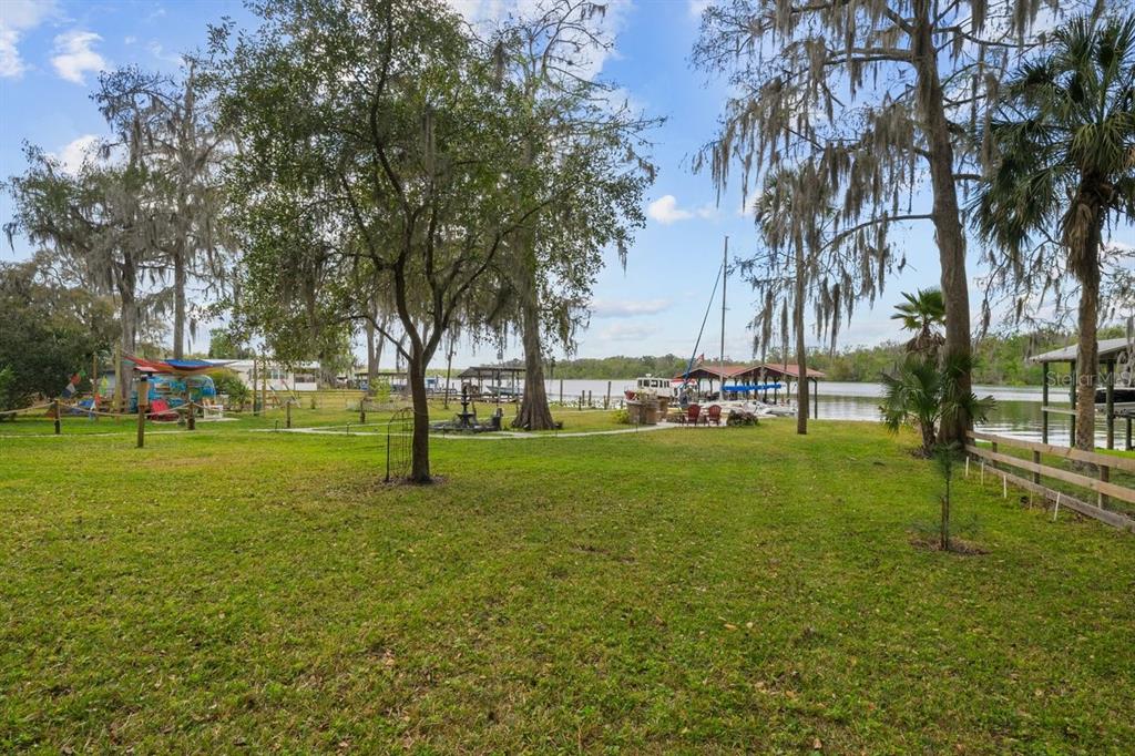 101 Orange Street Satsuma, FL 32189 - Photo 29 of 65 a park with lots of trees and plants