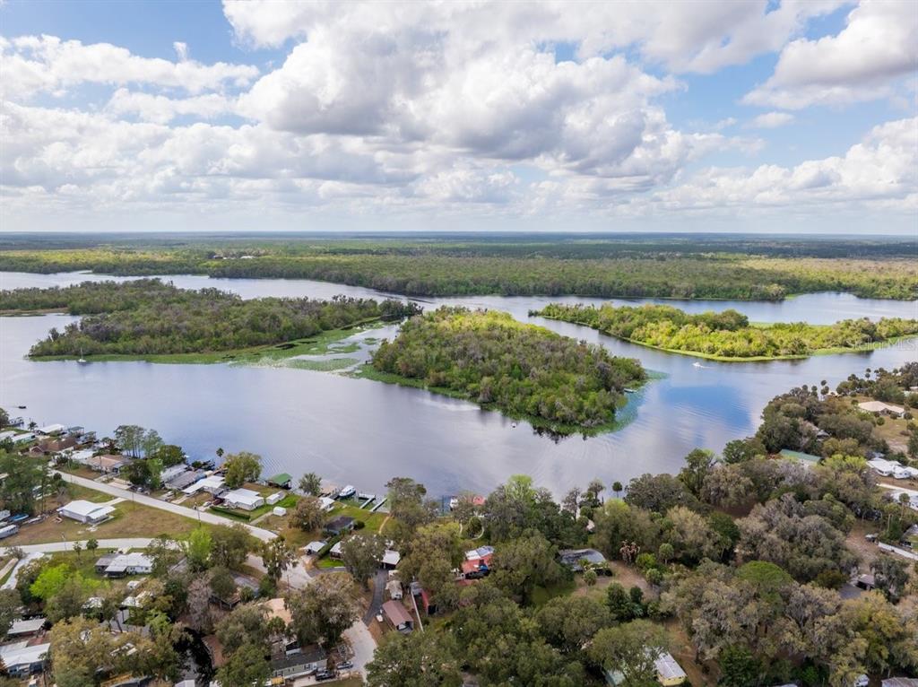 101 Orange Street Satsuma, FL 32189 - Photo 54 of 65 a view of a lake with a mountain