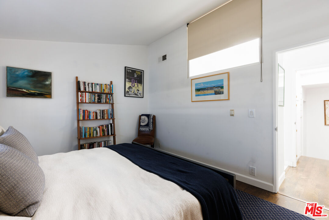 36 Navy Street, Unit 4 Venice, CA 90291 - Photo 29 of 37 a bedroom with a bed and a flat screen tv