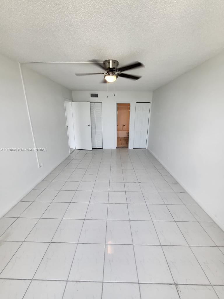 13499 Biscayne Boulevard, Unit 1204 North Miami, FL 33181 - Photo 6 of 14 a view of an empty room