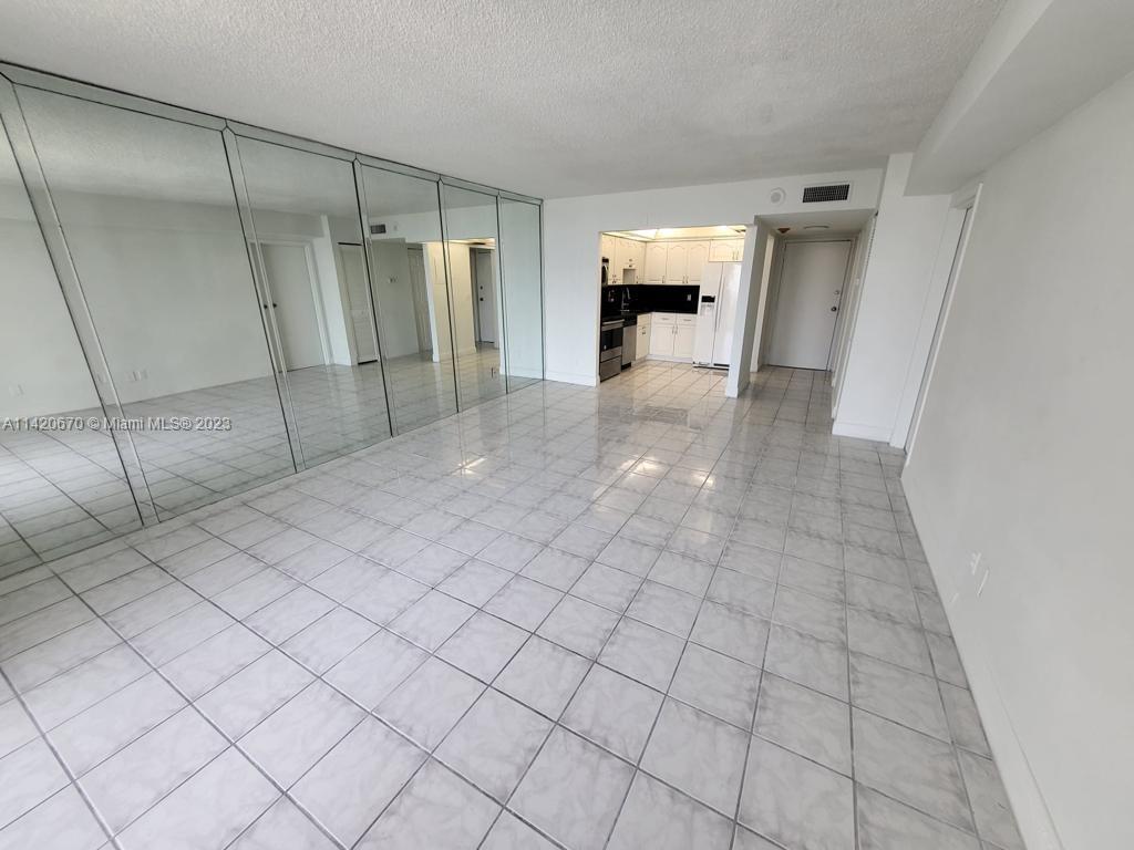 13499 Biscayne Boulevard, Unit 1204 North Miami, FL 33181 - Photo 9 of 14 a view of empty room