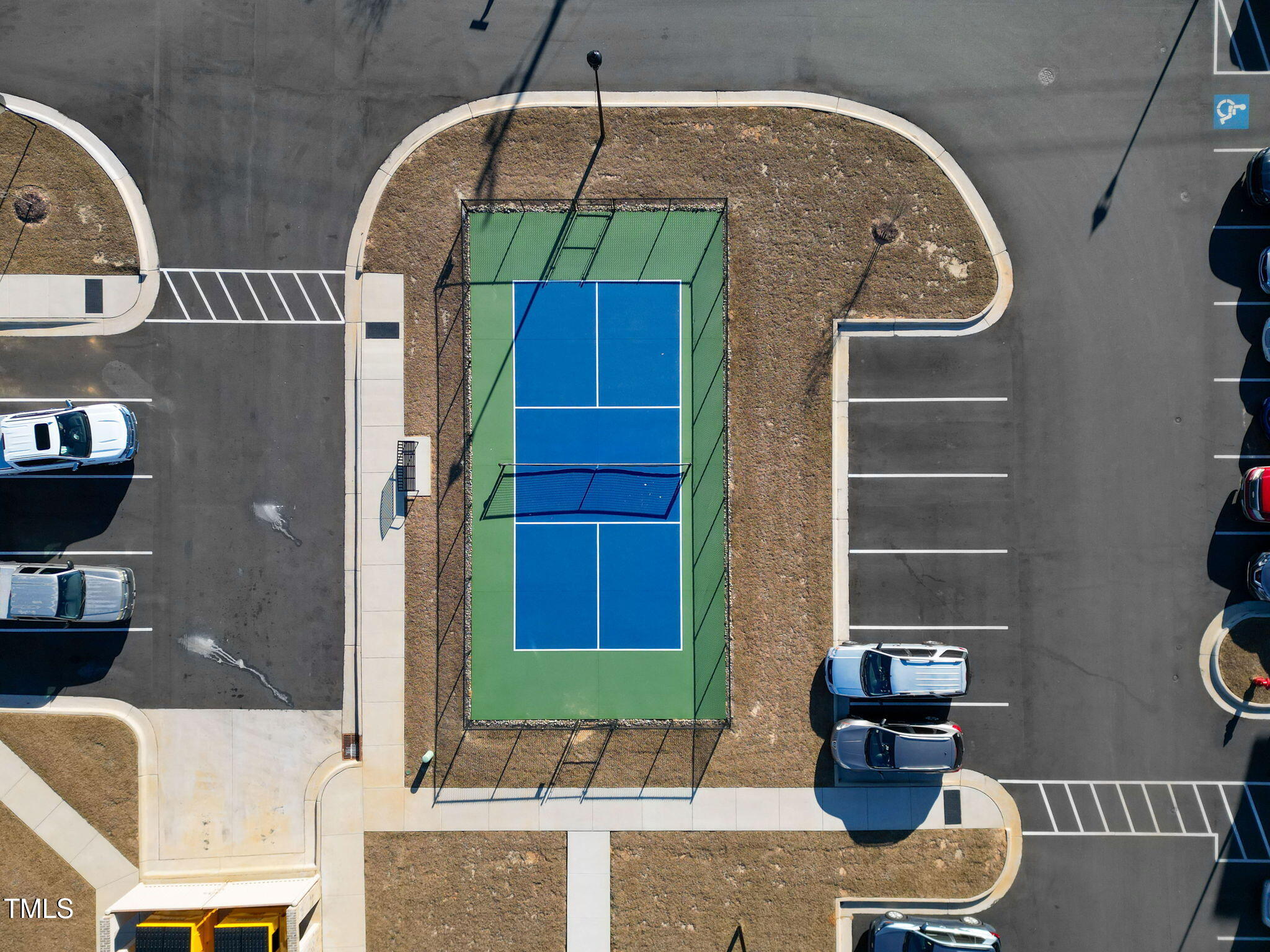 170 Grove Circle, Unit 302 Lillington, NC 27546 - Photo 24 of 28 a front view of a house with outdoor seating