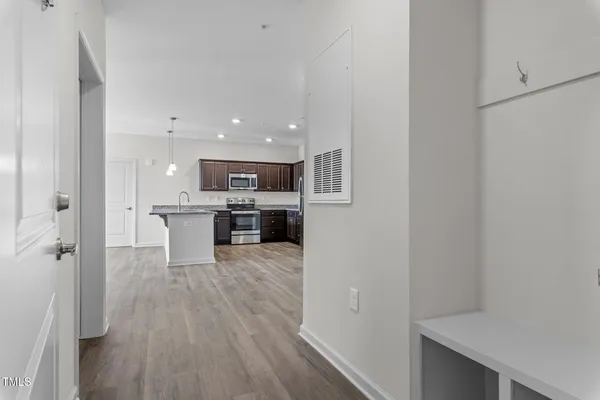 a view of kitchen with wooden floor