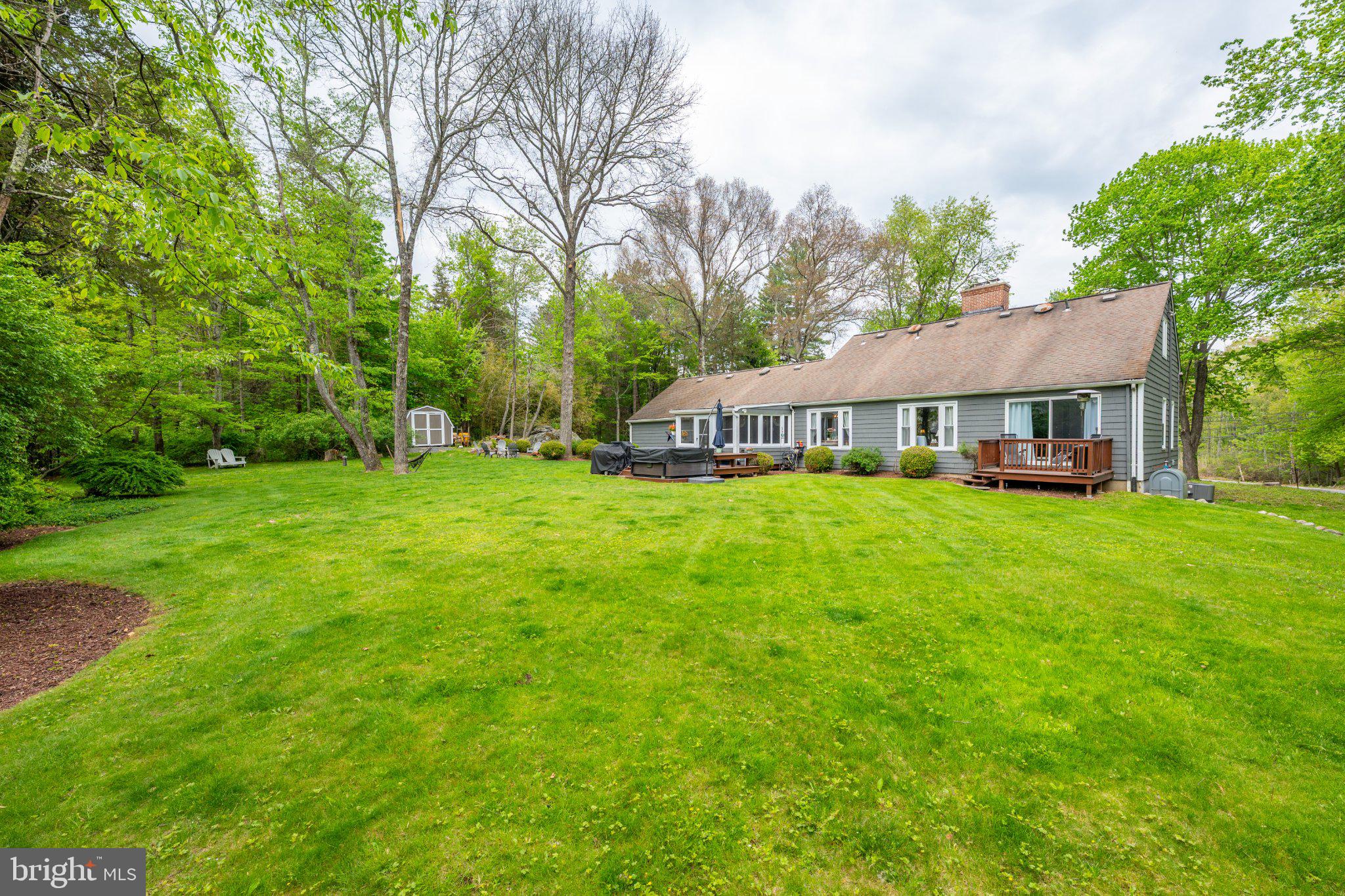 1 W Road Boonton, NJ 07005 - Photo 9 of 45 Serene home nestled in lush greenery.