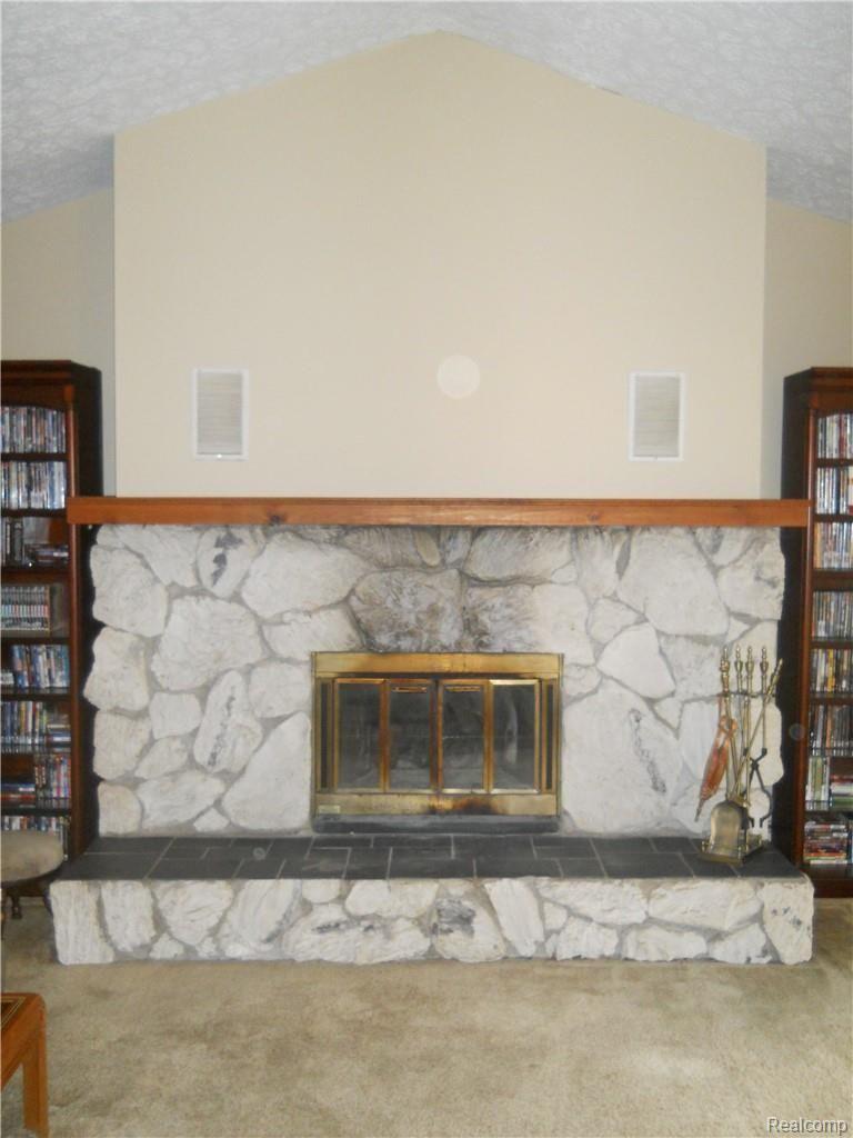 4237 Rurik Drive Howell, MI 48843 - Photo 13 of 37 fieldstone surround natural fireplace