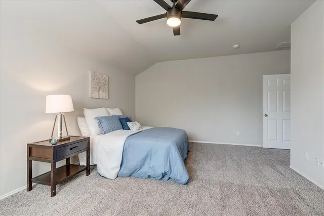 a room with a bed and a table