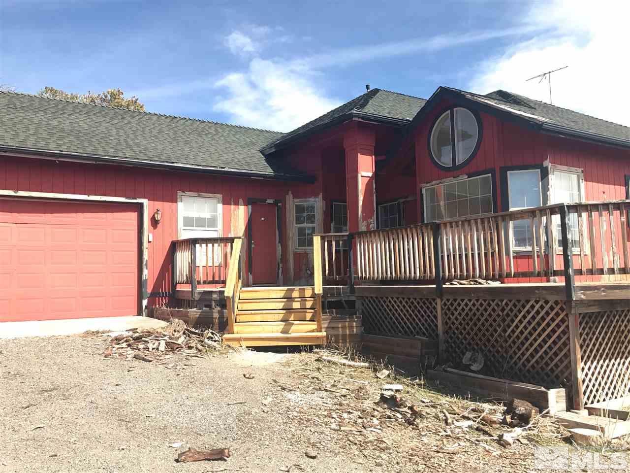 1961 Saddleback Road Reno, NV 89521 - Photo 1 of 1 a view of a house with a wooden fence