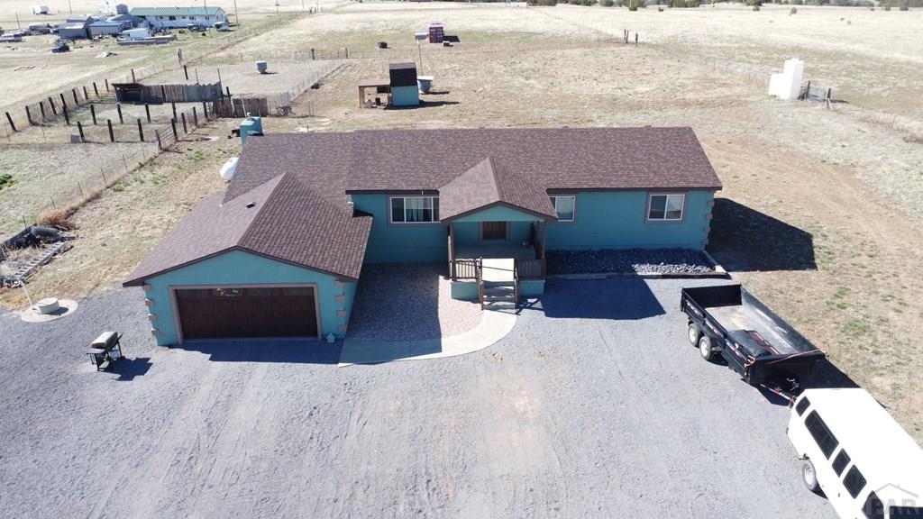 6023 South Waterbarrel Road Beulah, CO 81023 - Photo 2 of 63 an aerial view of a house with wooden floor
