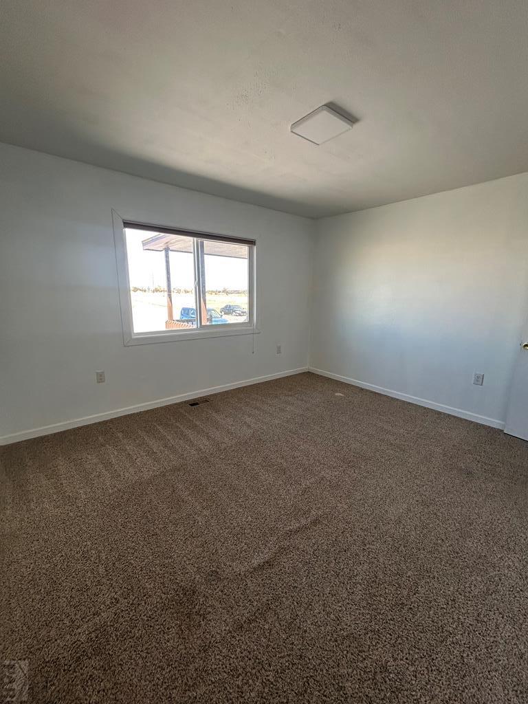 6023 South Waterbarrel Road Beulah, CO 81023 - Photo 30 of 63 an empty room with a window