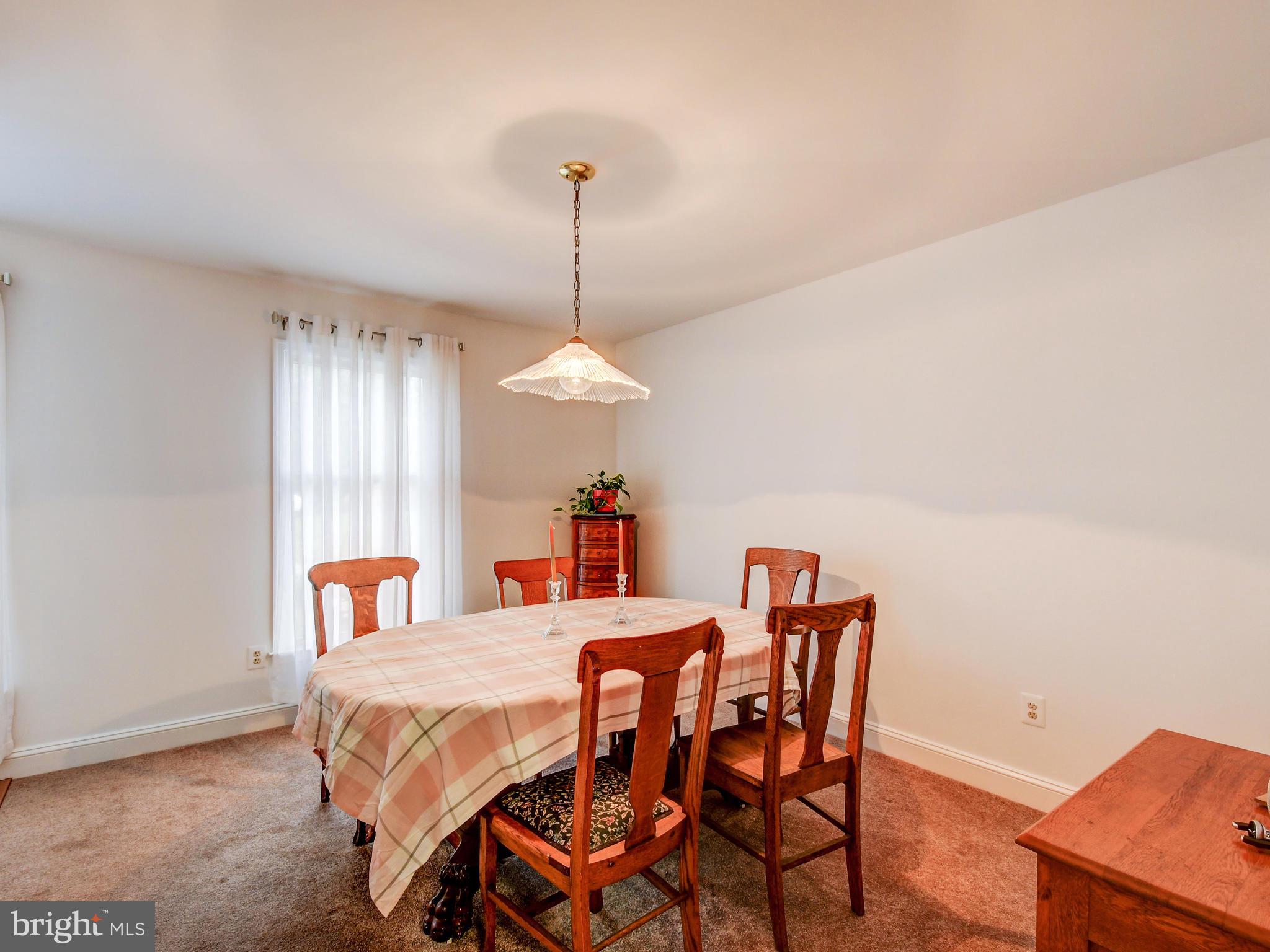 12314 Timber Grove Road Reisterstown, MD 21136 - Photo 19 of 42 Formal dining room with custom light fixture!