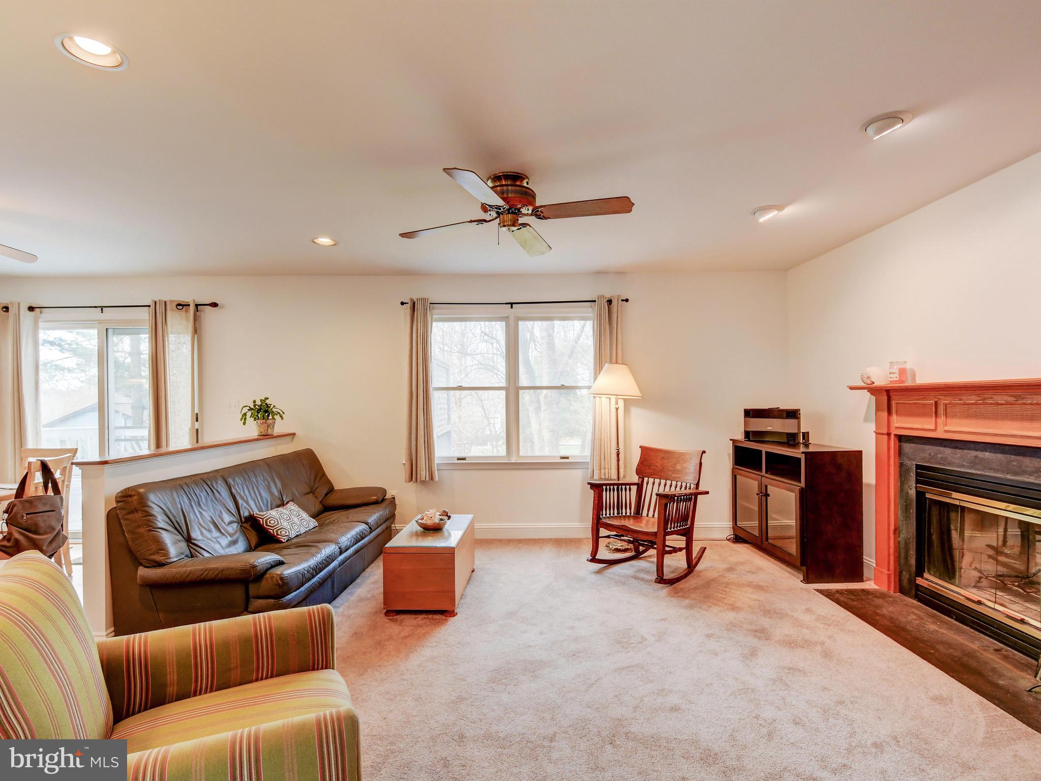 12314 Timber Grove Road Reisterstown, MD 21136 - Photo 10 of 42 Family room features a wood burning fireplace!