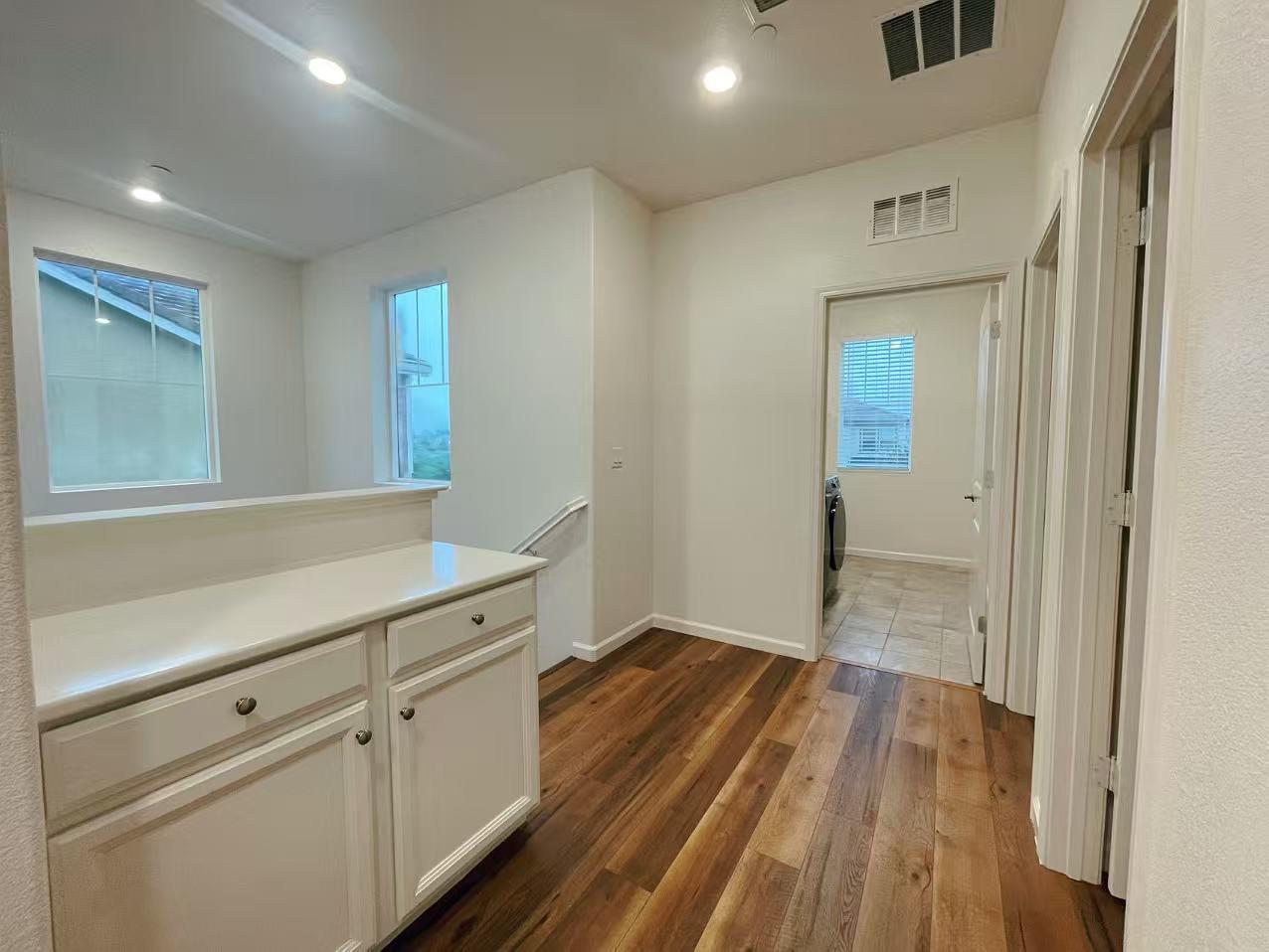3781 Samuelson Way Sacramento, CA 95834 - Photo 19 of 42 a hallway view with wooden floor
