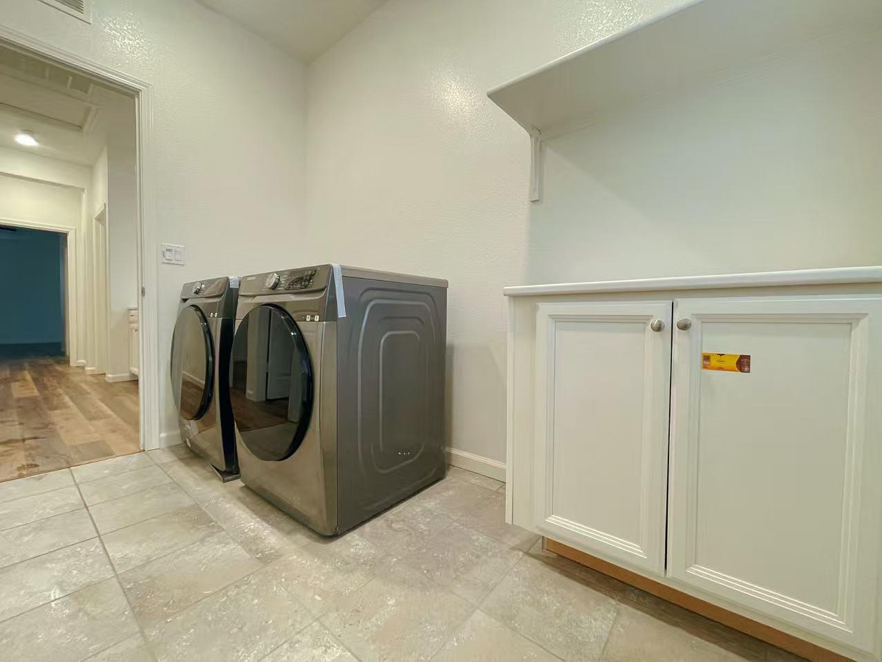 3781 Samuelson Way Sacramento, CA 95834 - Photo 20 of 42 a utility room with dryer and washer
