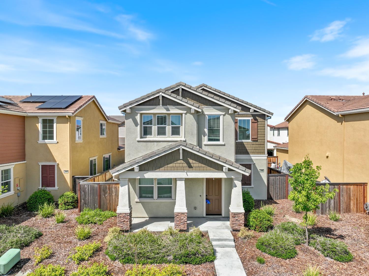 3781 Samuelson Way Sacramento, CA 95834 - Photo 2 of 42 a front view of a house with a yard