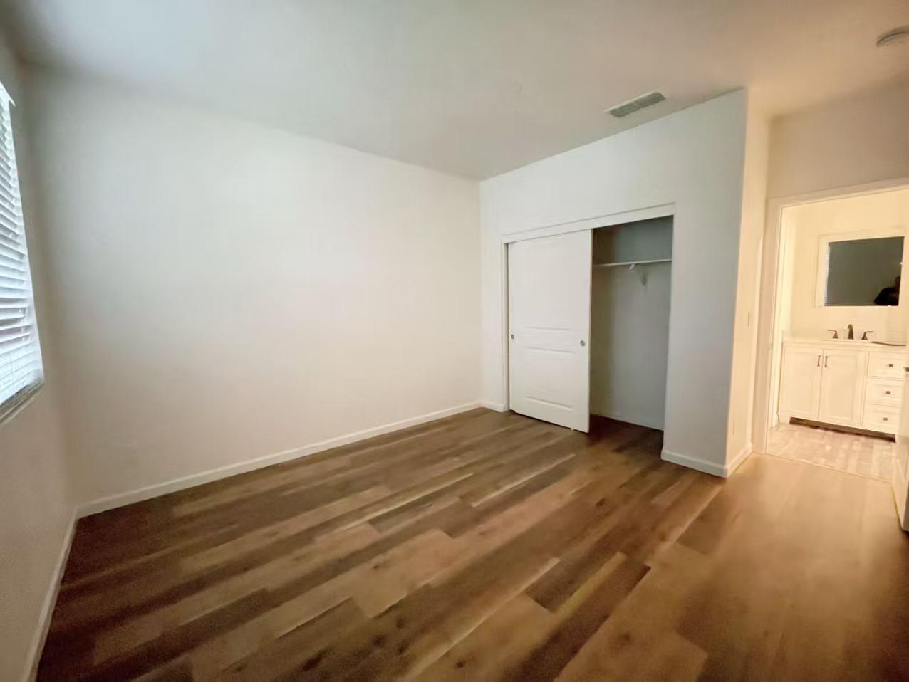 3781 Samuelson Way Sacramento, CA 95834 - Photo 6 of 42 a view of empty room with wooden floor