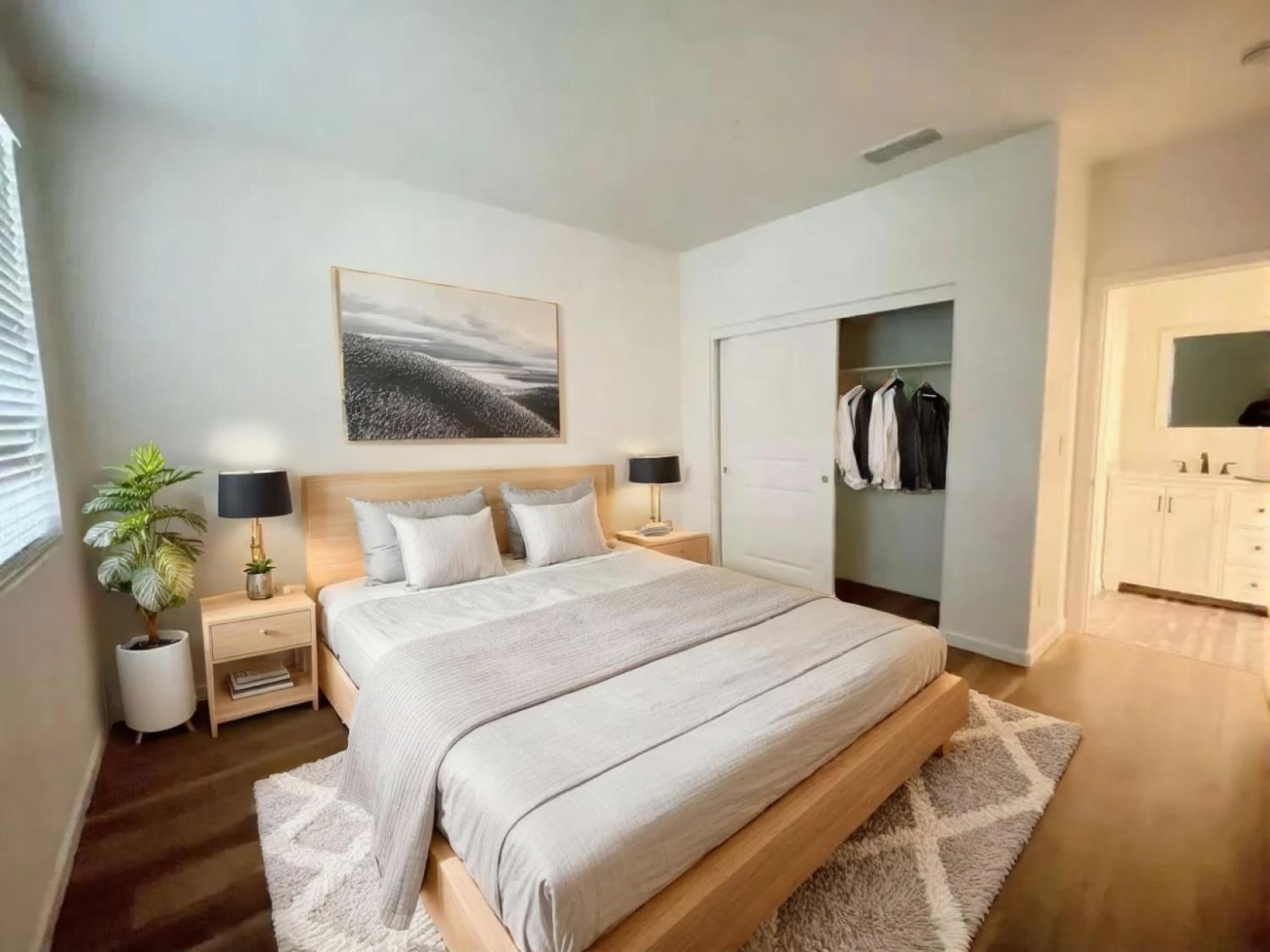 3781 Samuelson Way Sacramento, CA 95834 - Photo 7 of 42 a bedroom with a bed and furniture