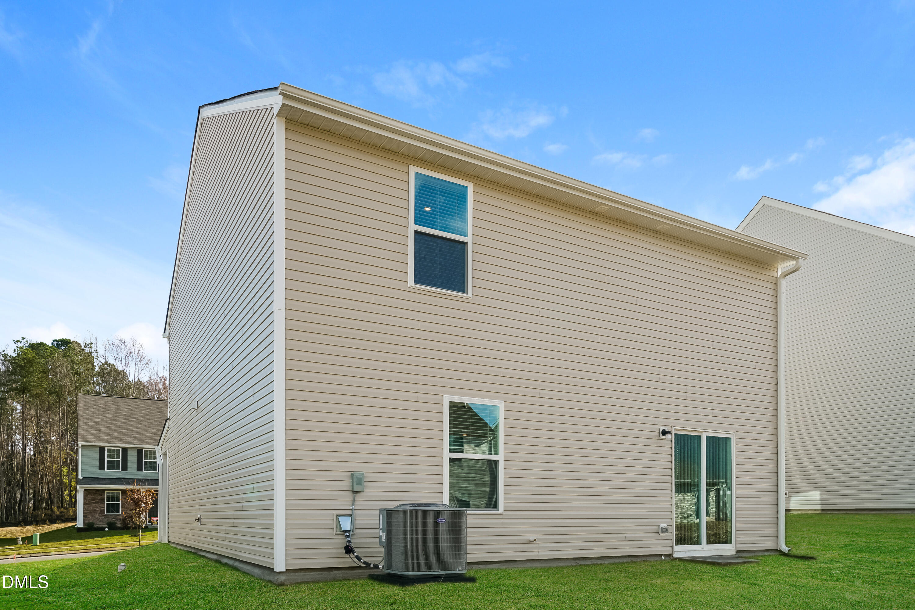 741 Cider Ml Way Zebulon, NC 27597 - Photo 15 of 17 a front view of house with yard