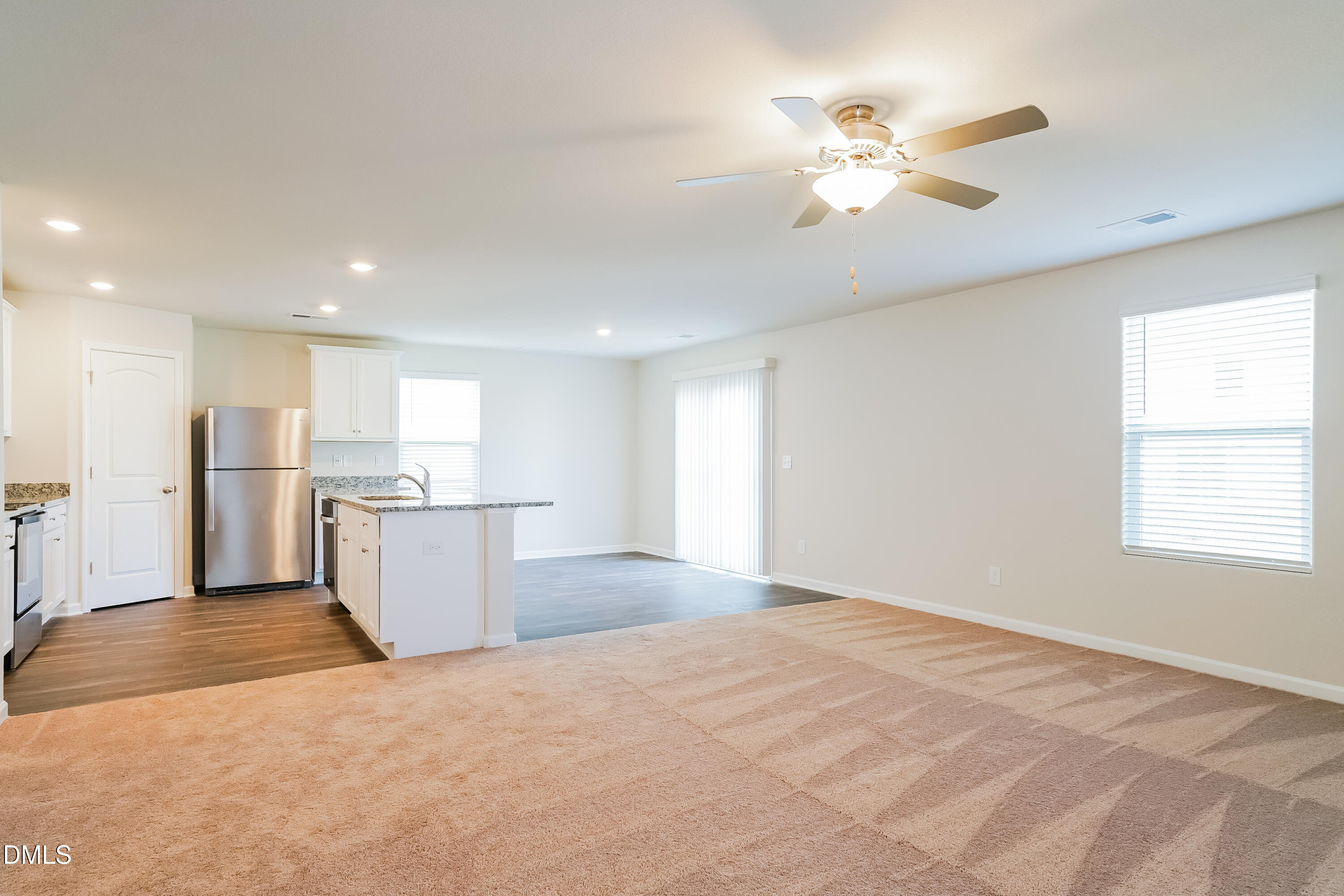 741 Cider Ml Way Zebulon, NC 27597 - Photo 3 of 17 a view of a kitchen with a sink and a window