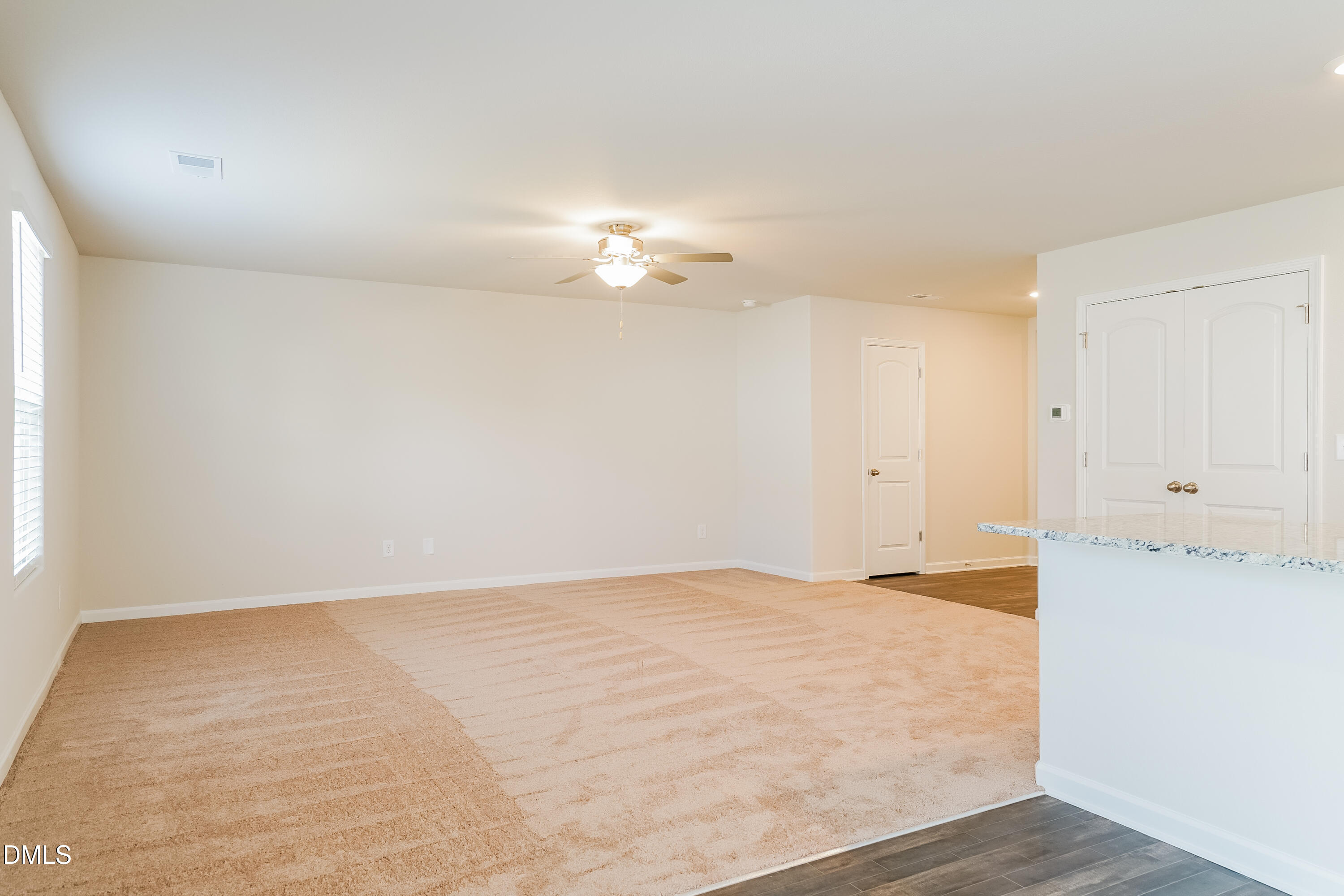 741 Cider Ml Way Zebulon, NC 27597 - Photo 4 of 17 wooden floor in an empty room