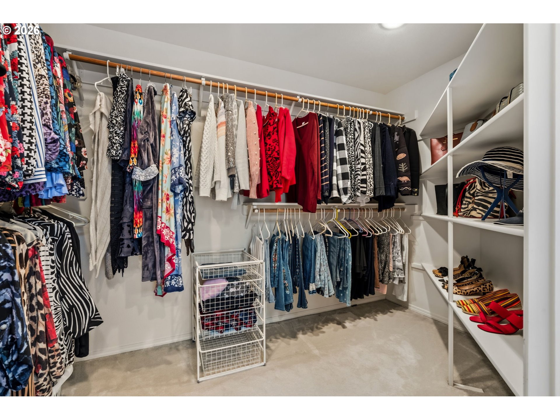 6108 Southwest Kruse Ridge Drive Portland, OR 97219 - Photo 28 of 42 a view of walk in closet with clothes