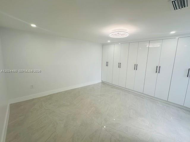 11870 Southwest 5th Street, Unit A Miami, FL 33184 - Photo 13 of 18 a view of an empty room