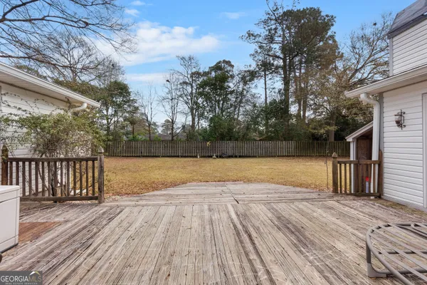 a view of balcony with wooden floor