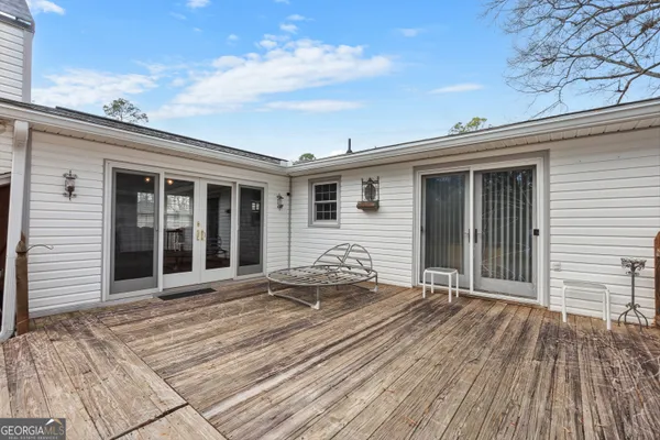 a front view of a house with a patio