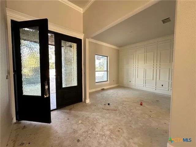 a view of an empty room with window