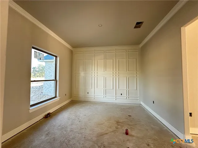 an empty room with windows