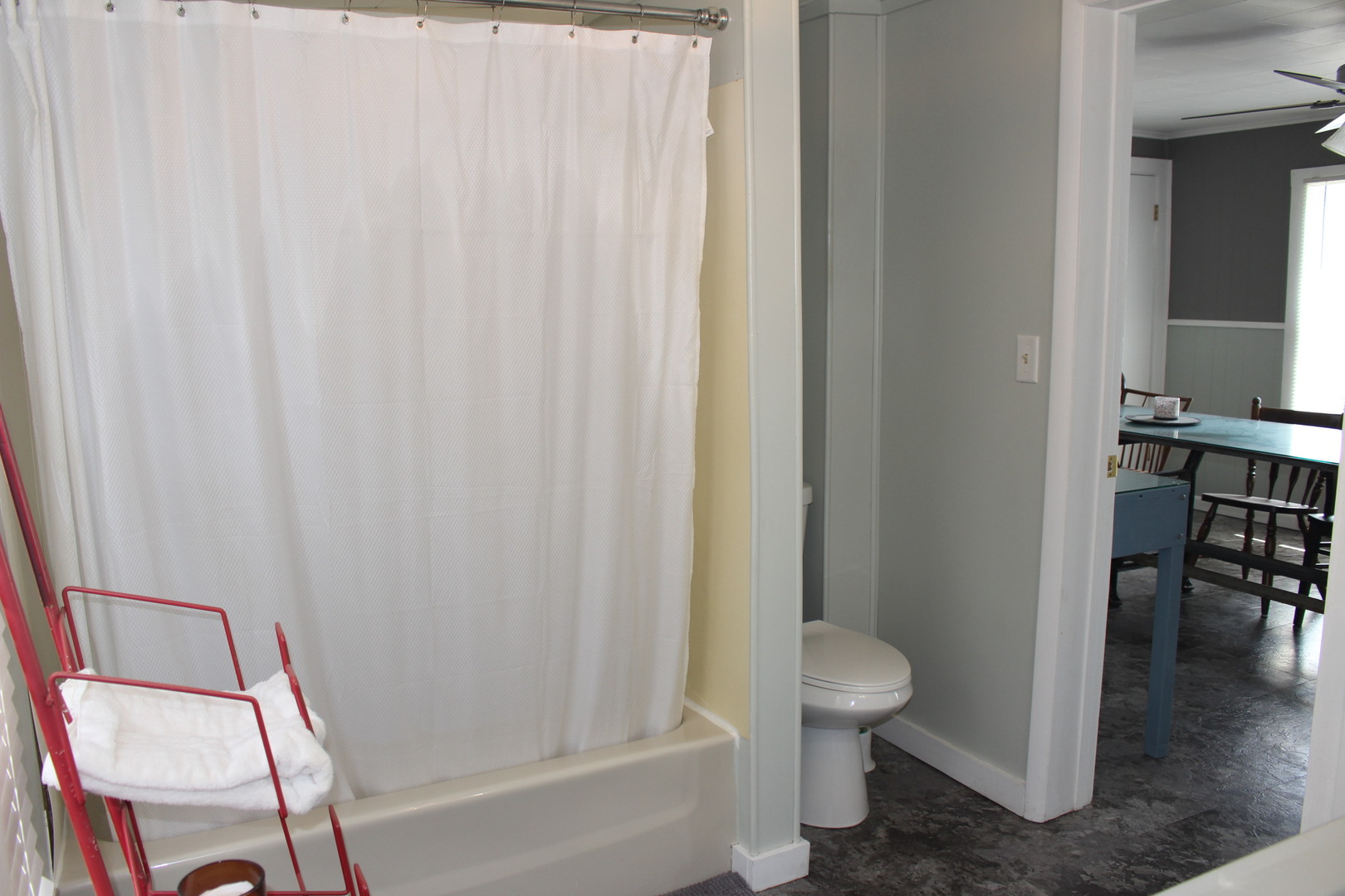 216 South Grant Street Clinton, IL 61727 - Photo 16 of 29 a bathroom with a granite countertop sink and a toilet