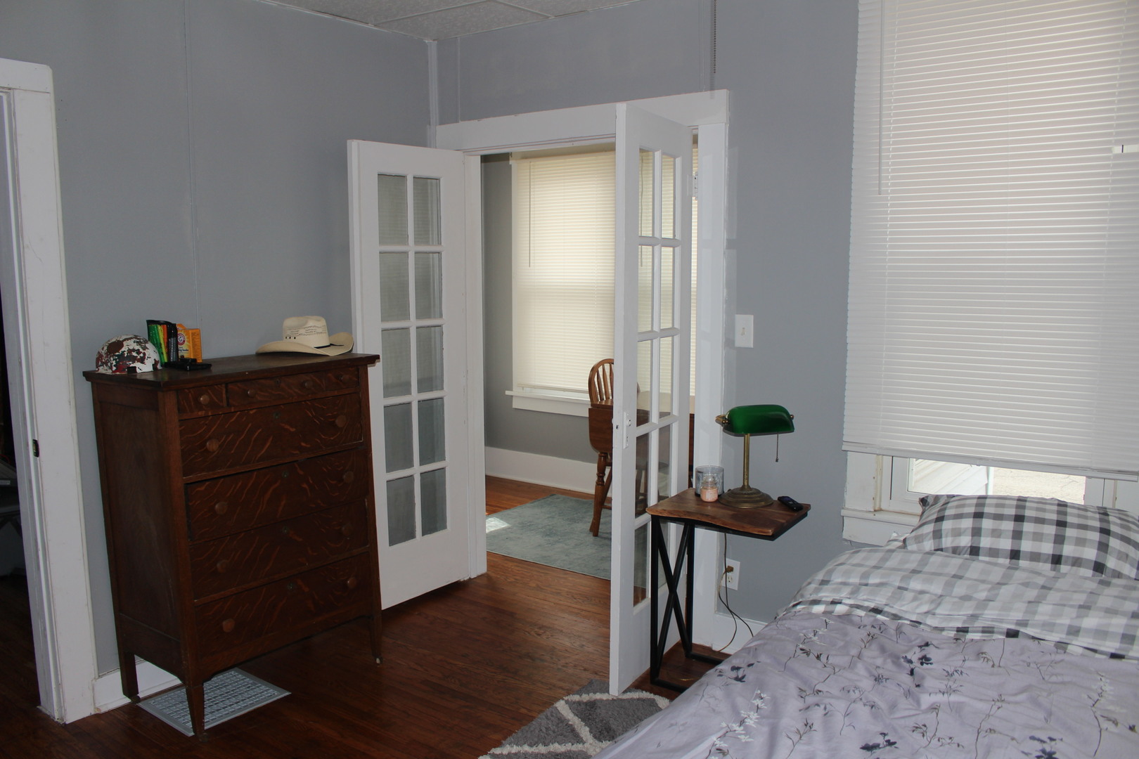 216 South Grant Street Clinton, IL 61727 - Photo 22 of 29 a living room with furniture and wooden floor