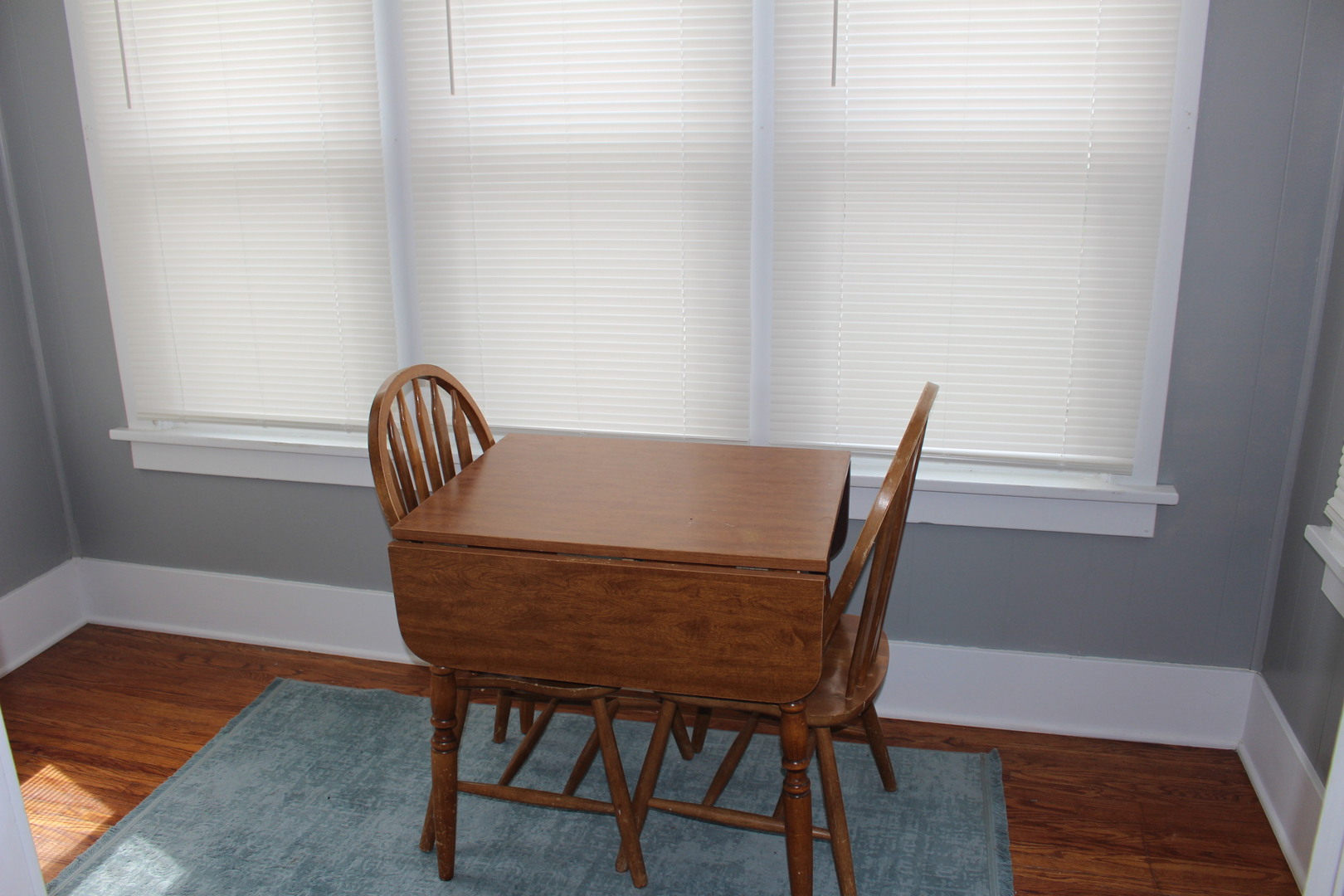 216 South Grant Street Clinton, IL 61727 - Photo 23 of 29 a view of a dining room with furniture and wooden floor