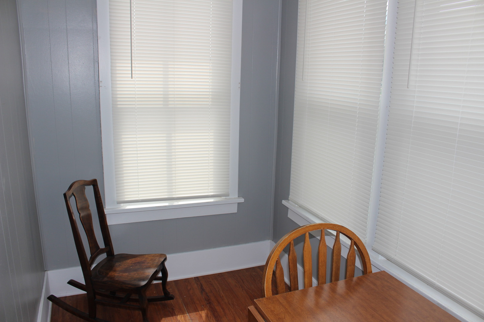 216 South Grant Street Clinton, IL 61727 - Photo 24 of 29 a view of a workspace with furniture and a window