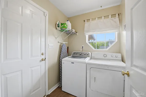 a utility room with dryer and washer