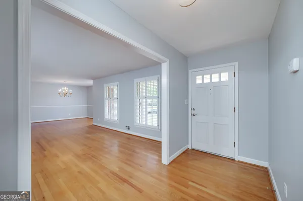 a view of an empty room and window