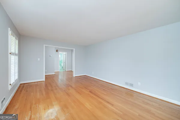 a view of an empty room and window