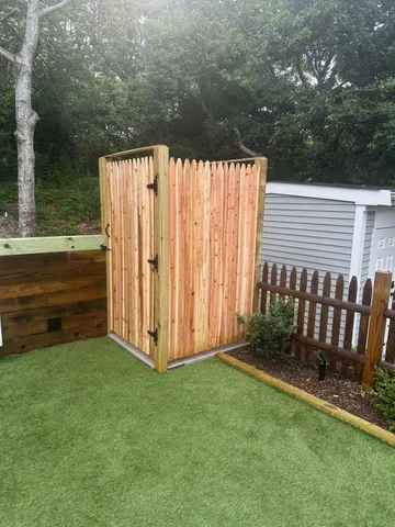 a view of backyard with green space