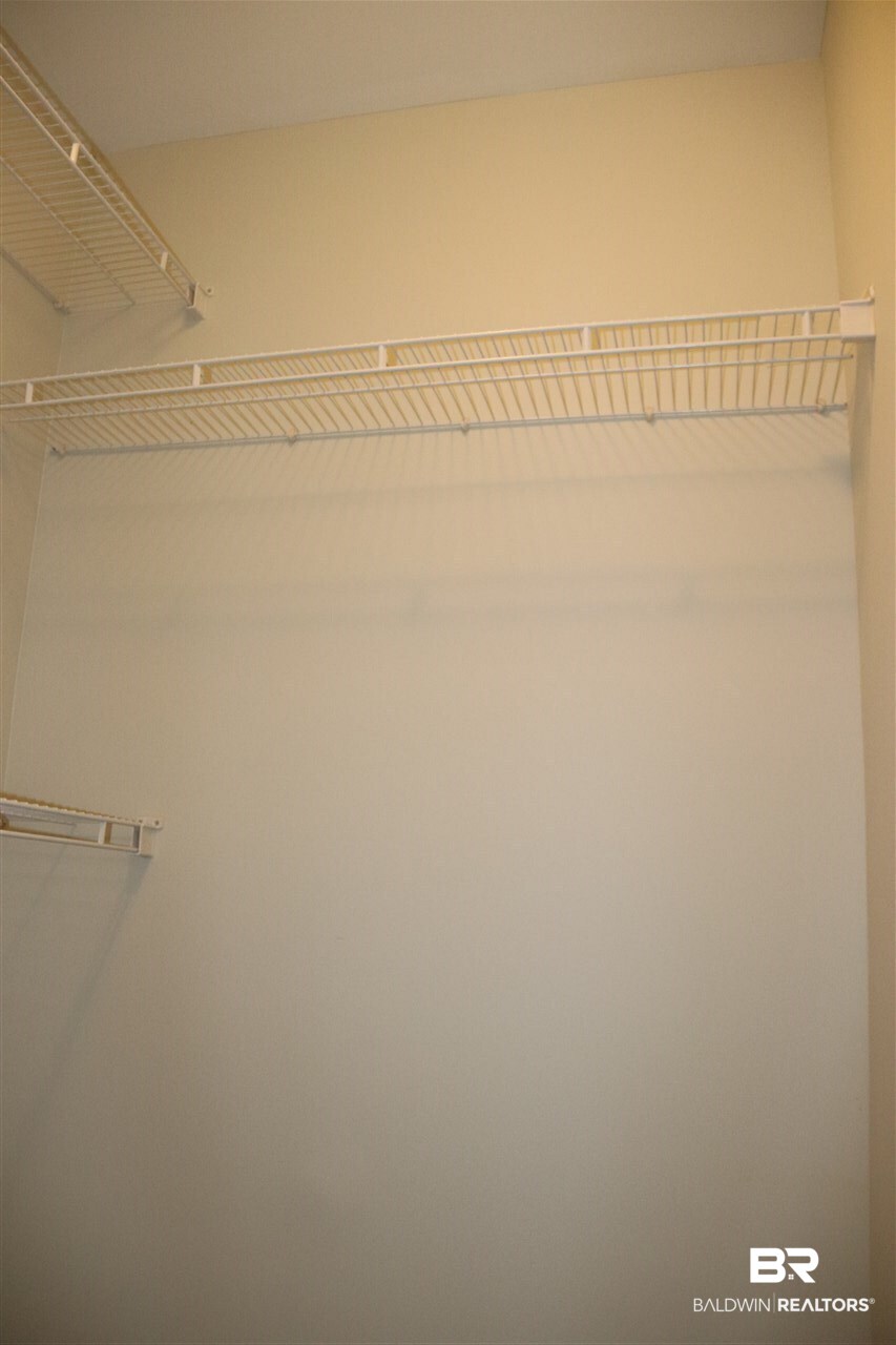 1517 Regency Road, Unit 122 Gulf Shores, AL 36542 - Photo 20 of 37 Walk-In Closet BR2