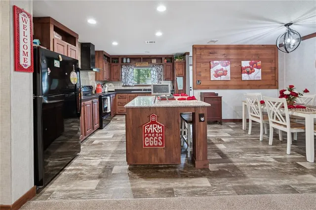 a bedroom with a bed and a table in it