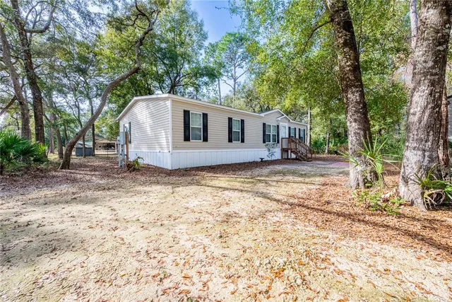 a house with trees in front of it