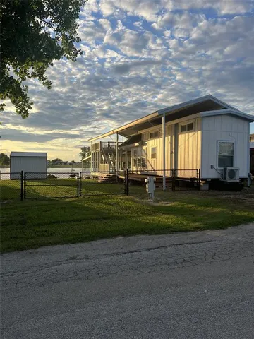 a childrens park with lots of swings and slides