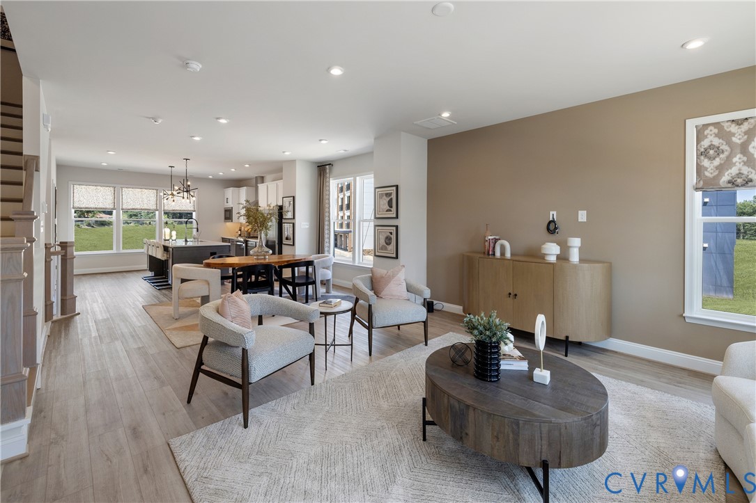 16120 Esteem Way Midlothian, VA 23113 - Photo 12 of 42 a living room with furniture and wooden floor