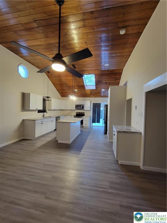169 Hatch Gravel Road Bath, PA 18014 - Photo 3 of 7 a view of a kitchen with microwave and cabinets