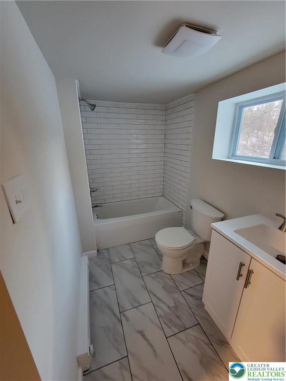 169 Hatch Gravel Road Bath, PA 18014 - Photo 4 of 7 a bathroom with a sink a toilet and shower