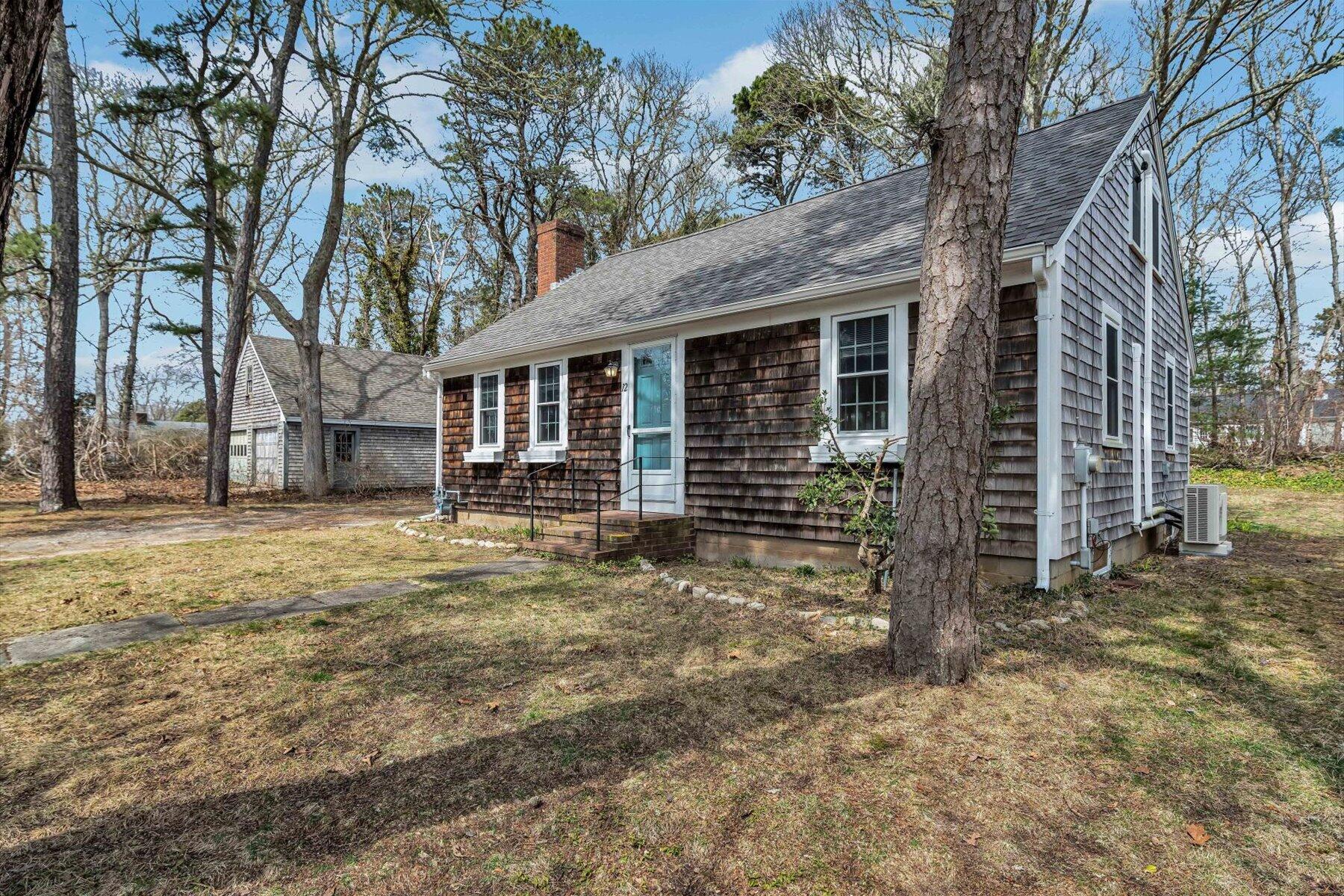 12 Gilbert Road Dennis Port, MA 02639 - Photo 3 of 54 a view of a house with a yard