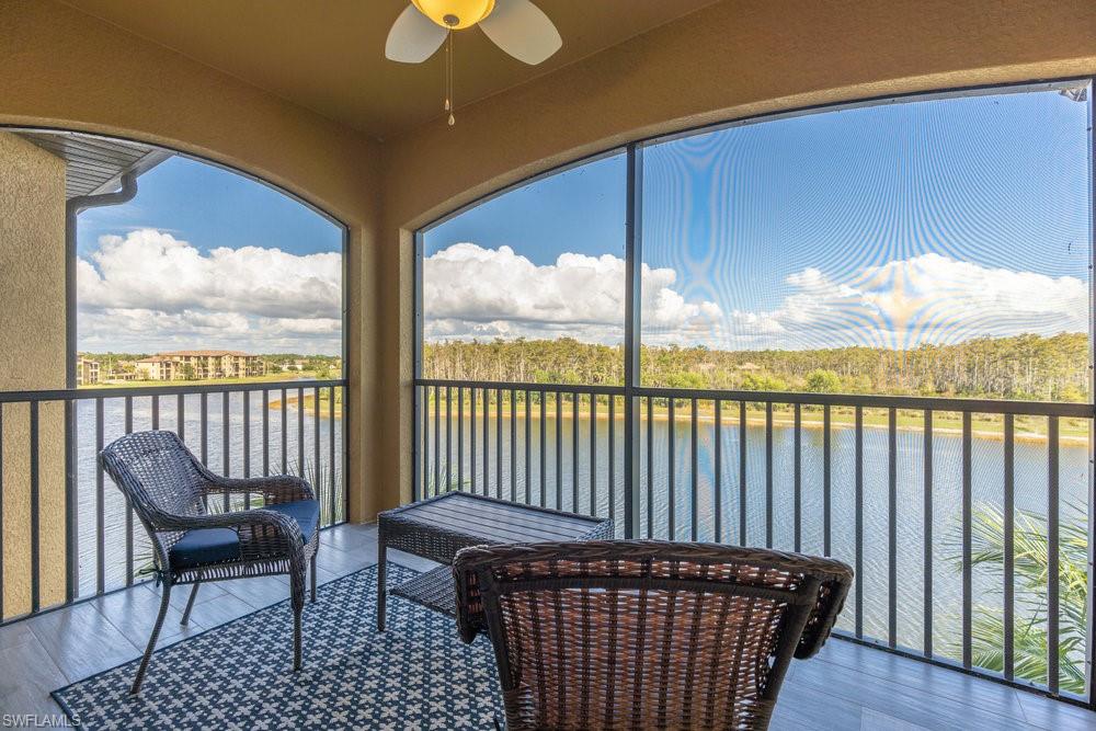 9578 Trevi Court, Unit 5142 Naples, FL 34113 - Photo 22 of 49 a balcony with wooden floor view