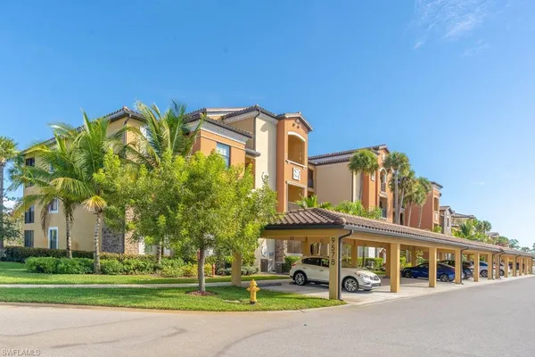 a front view of a building with garden