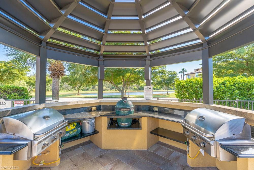 9578 Trevi Court, Unit 5142 Naples, FL 34113 - Photo 34 of 49 a room with furniture and a window