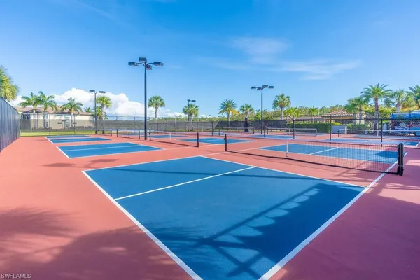 a view of an outdoor space and tennis court