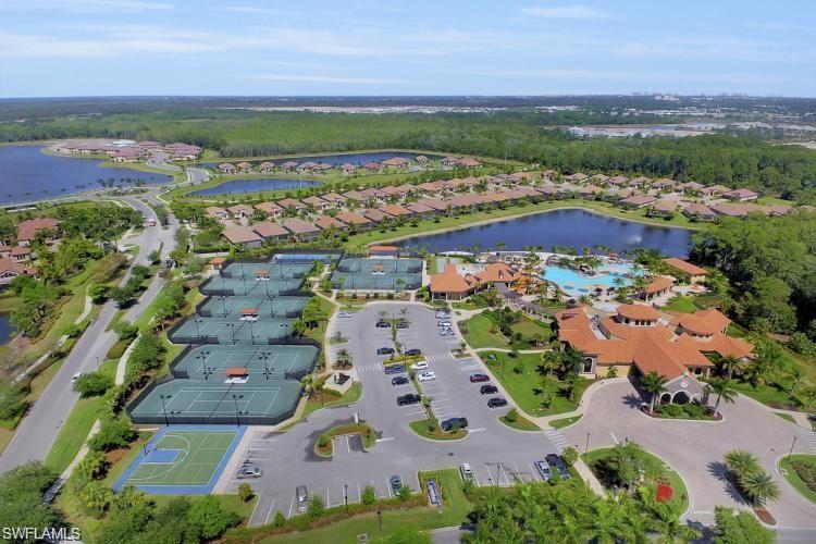 9578 Trevi Court, Unit 5142 Naples, FL 34113 - Photo 37 of 49 an aerial view of residential houses with outdoor space